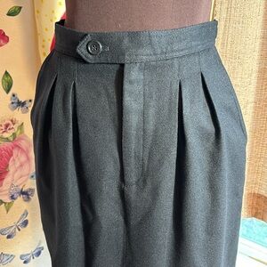Vintage 1980’s Chaus casual/chic solid black wool pleated midi skirt. Size 10.